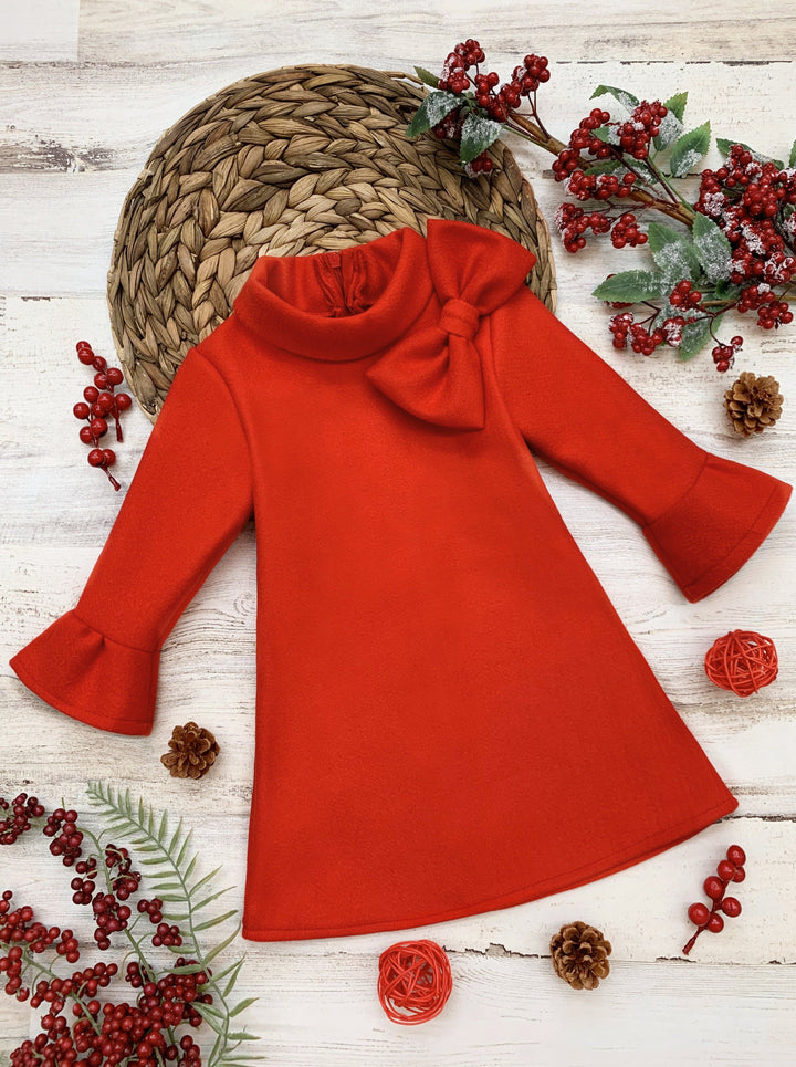 Little girls fall long-sleeve A-line dress with a wide turtle neck, large bow detail, and ruffled scuffs - Mia Belle Girls