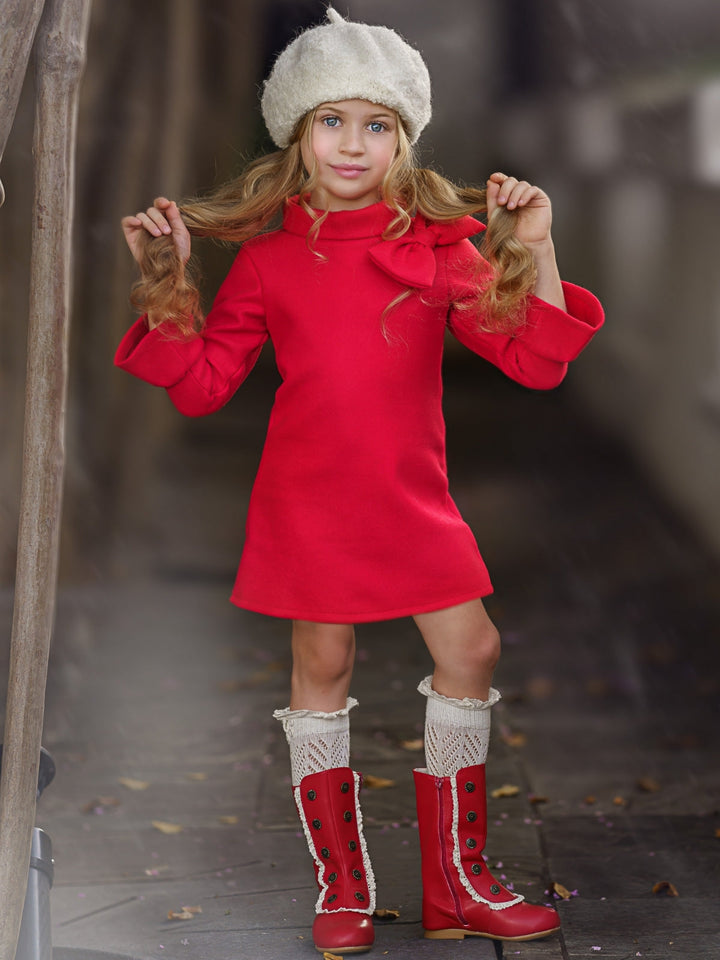 Little girls fall long-sleeve A-line dress with a wide turtle neck, large bow detail, and ruffled scuffs - Mia Belle Girls