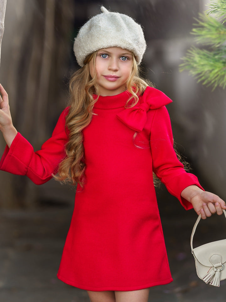 Little girls fall long-sleeve A-line dress with a wide turtle neck, large bow detail, and ruffled scuffs - Mia Belle Girls