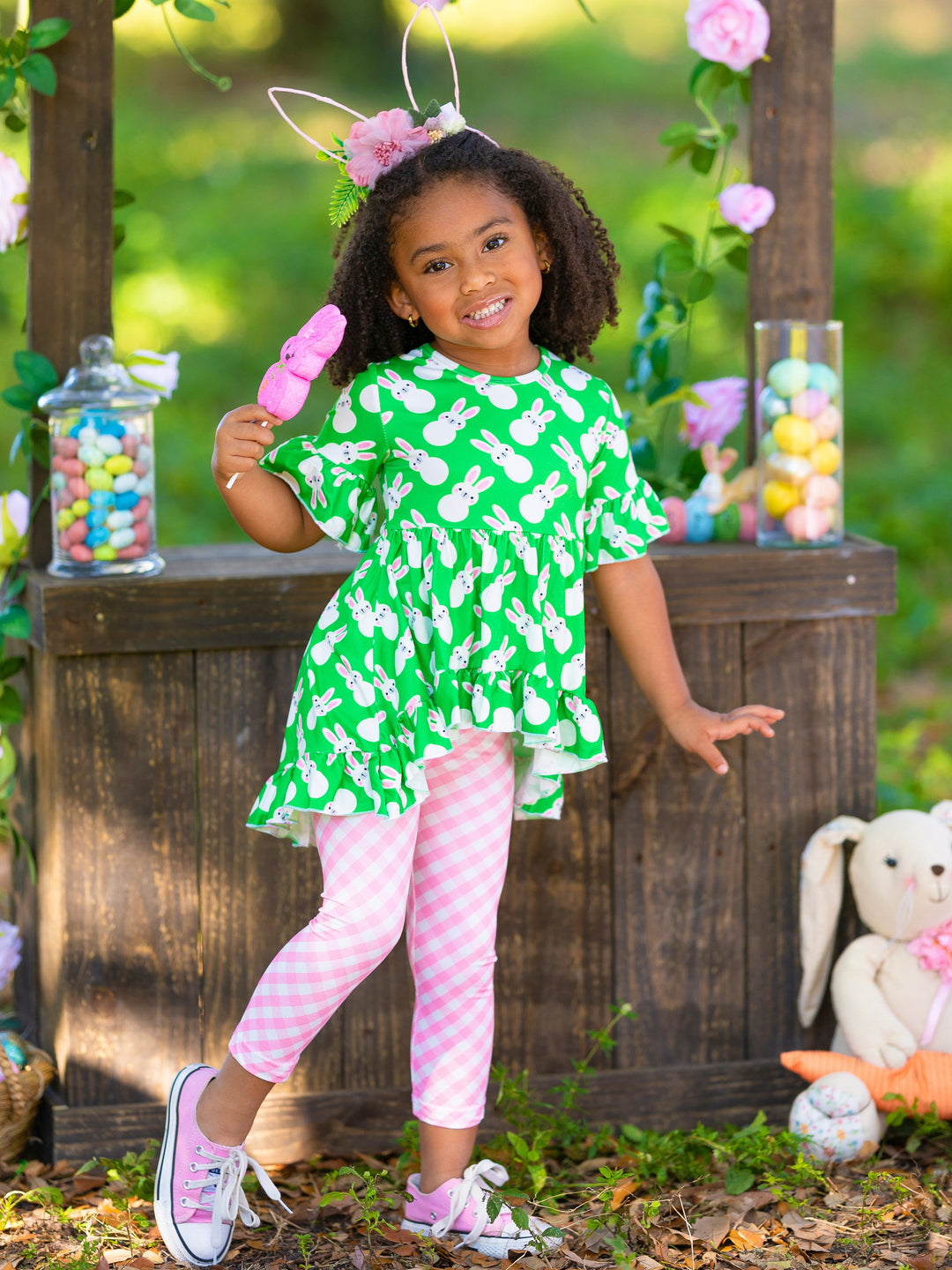 Girls Easter-themed set features ruffle sleeve hi-lo tunic and all-over floral or plaid print stretchy leggings for 2T to 10Y for toddlers and girls