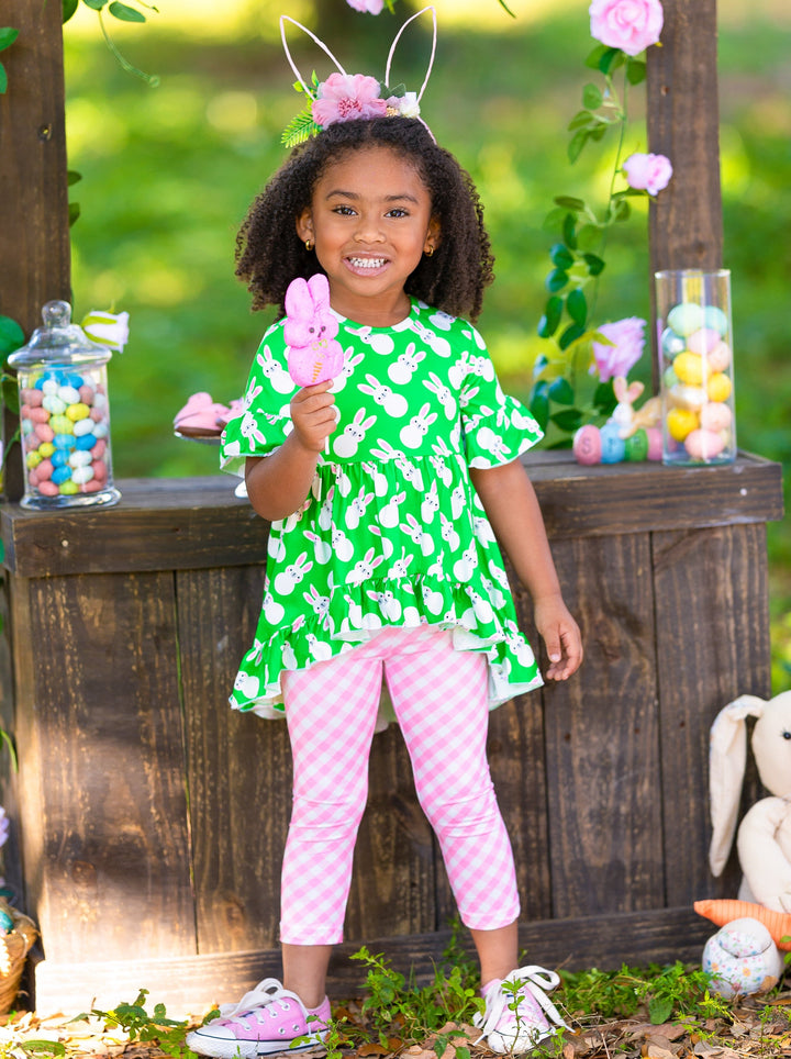 Girls Easter-themed set features ruffle sleeve hi-lo tunic and all-over floral or plaid print stretchy leggings for 2T to 10Y for toddlers and girls