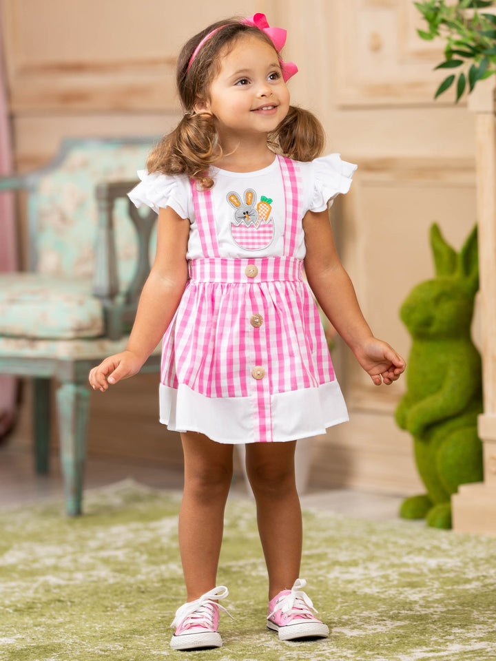 girls spring set features a white top with ruffle sleeves and bunny applique and a plaid skirt with suspenders and faux buttons and a white hem 2T to 10Y